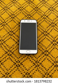 Samsung Galaxy Note 3 Isolated On Carpet Background.