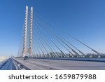 The Samuel De Champlain Bridge is a twin cable-stayed bridge built to replace the original Champlain Bridge over the Saint Lawrence River in Quebec between the Island of Montreal and the South Shore.