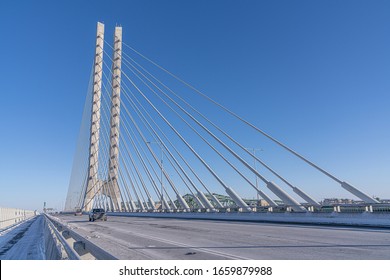 The Samuel De Champlain Bridge is a twin cable-stayed bridge built to replace the original Champlain Bridge over the Saint Lawrence River in Quebec between the Island of Montreal and the South Shore.