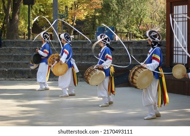 Samul nori  is a genre of percussion music that originated in Korea. The word samul means "four objects", while nori means "play". It is performed with four traditional Korean musical instruments. - Shutterstock ID 2170493111