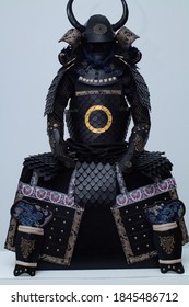 samurai armor, with bull horns and a white background