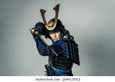 Samurai in armor wielding a sword.　Japanese traditional warrior.