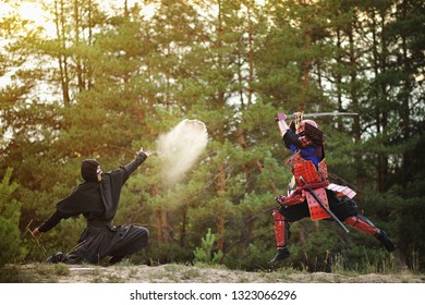 Samurai Fight With Ninjas On A Background Of Forest And Sand