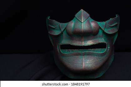 samurai mask with a black background