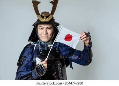 Samurai Showing The Japanese Flag.