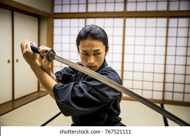 Samurai training in a traditional dojo, in Tokyo - Powered by Shutterstock