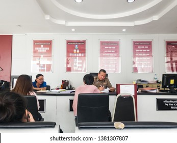 Samut Prakan, Thailand - April 26, 2019: Plaintiff reporting a case to a Thai Police Officers on duty at a Local Police Station