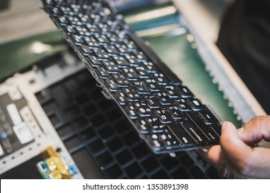 Samut Prakan, Thailand - March, 2019: Dell Laptop Keyboard Being Replaced By Asian Dell Technician