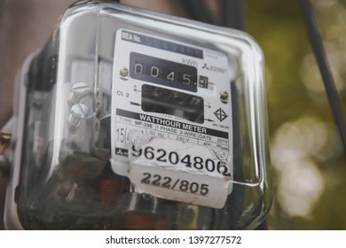 Samut Prakan, Thailand - May 14, 2019: Close up of Thai Metropolian Electricity Authority watt hour meter. This meter measure how much the house owner should pay their electric bills. - Shutterstock ID 1397277572