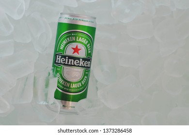 SAMUTSONGKHRAM, THAILAND - April 18, 2019: Heineken Can On Ice, Heineken Lager Beer Is A Pale Lager Beer With 5% Alcohol, Produced By The Dutch Brewing Company Heineken International