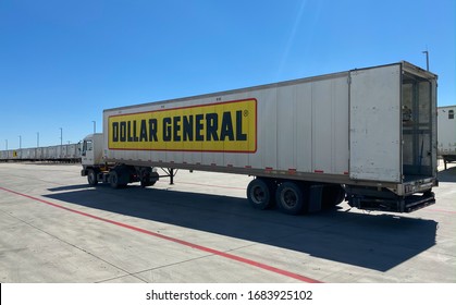 SAN ANTONIO, TEXAS - 02/27/2020 - Semi Truck From Dollar General Company With Open Semi Trailer Doors. Warehousing And Distribution At Major American Retailer.