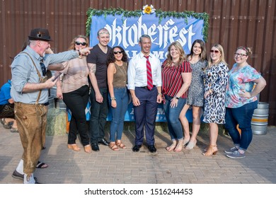 SAN ANTONIO, TX - SEPTEMBER 27, 2019 - Mayor Of San Antonio, Ronald Adrian Nirenberg Attending The Oktoberfest Celebration At Alamo Brewery. He Is Taking A Group Photo  With The Attendees 