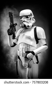 SAN BENEDETTO DEL TRONTO, ITALY. NOVEMBER 11, 2017. Studio portrait  of stormtrooper costume replica, with blaster E-11 gun. He is a fictional character of Star Wars saga. Black  and white picture 