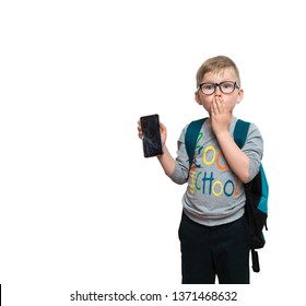 San Child With Broken Glass Screen Of Smartphone In His Hand. Fault Of The Kids.  Kid Fear Of Punishment. Boy Of Primary School With Phone Isolated On White.