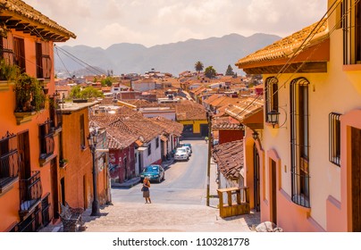 SAN CRISTOBAL DE LAS CASAS, MEXICO, MAY, 17, 2018: Street view and sidewalk in the historical centre of San Cristobal de las Casas