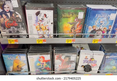 San Diego, CA - July 2, 2022: Various Disney Cartoon Movies For Kids On A Shelf Inside A Department Store.