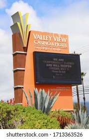 San Diego, CA / USA - April 11, 2020: Temporarily Closed Sign And Will Reopen May 8 Sign At The Valley View Casino & Hotel.