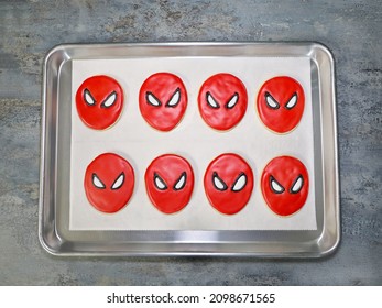 San Diego, CA USA - December 12, 2021: The Process Of Making A Spiderman Cookie. Super Hero Character's Face On Sugar Cookies With Royal Icing.