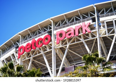 San Diego, CA USA - Feb 26 2021: Petco Park signage in San Diego at the Padres baseball stadium downtown showing the outside structure and lettering in the sun                               