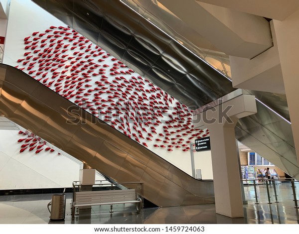 San Diego, CA (USA) - July 6,\
2019.The rental car station with non stop shuttle bus pick ups and\
drop offs to and from the San Diego International\
Airport.
