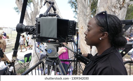 San Diego, CA / USA - June 30, 2018: A  Female Camera Operator Working At The San Diego Jazz Festival