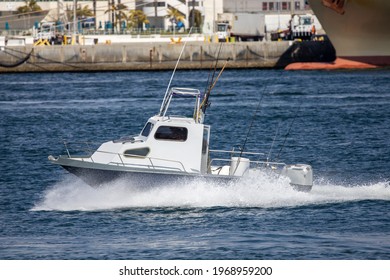 San Diego, CA USA - March 14, 2021: A Small Speed Boat With Fishing Rods.