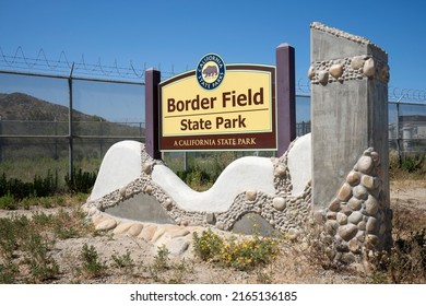 San Diego, CA, USA - May 14, 2022: The entrance sign of the Border Field State Park in San Diego, California, sitting in the very southwestern corner of the United States on the international border.