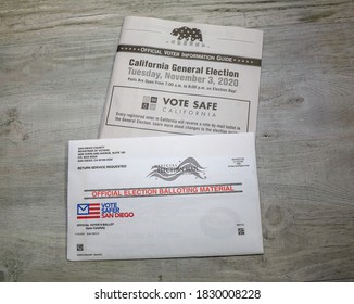 San Diego, CA / USA - October 8, 2020: View Of An Official Election Balloting Material Envelope And Official Voter Information Guide For California.