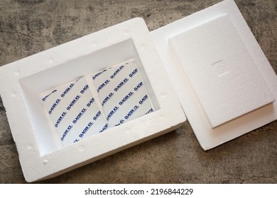 San Diego, CA USA - September 1, 2022: A Styrofoam Cooler With Lid And Ice Gel Packs For Shipping Perishable Food Or Medication. Cold Packing Material.