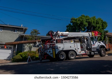 SAN DIEGO, CALIFORNIA- SEPT 9,  2019: Truck From San Diego Gas And Electric Company Getting Ready To Change An Electric Post In San Diego Area. 