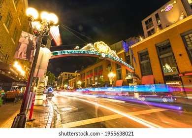 San Diego, California, United States - July 31, 2018: Entrance Sign To Gaslamp, An Historic District Of San Diego Downtown At Night. Light Trails Effect. Street View.