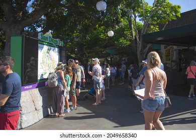 San Diego, California, United States - 09-23-2021: A View Of Guests Reviewing The San Diego Zoo Entrance Map.