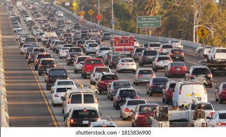 SAN DIEGO, CALIFORNIA USA - 15 JAN 2020: Emergency 911 auto on busy intercity freeway. Paramedic car in traffic jam on highway during rush hour. Transportation concept and transport in metropolis.