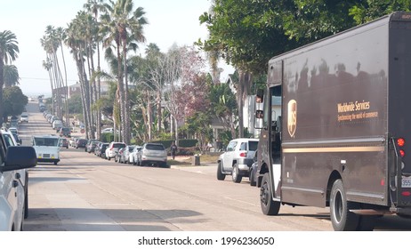 San Diego, California USA - 21 Nov 2020: UPS Mail Truck On City Street, Neighborhood Residential District. Postal Service Car Or Vehicle On Suburban Road. Delivery Pickup For Postman Or Deliveryman.