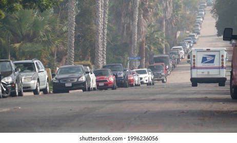 San Diego, California USA - 21 Nov 2020: USPS Mail Truck On City Street, Neighborhood Residential District. Postal Service Car Or Vehicle, Grumman LLV On Suburban Road. Delivery Pickup For Postman.