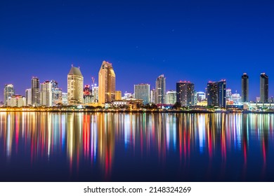 San Diego, California, USA downtown skyline on the San Diego Bay at night. - Powered by Shutterstock