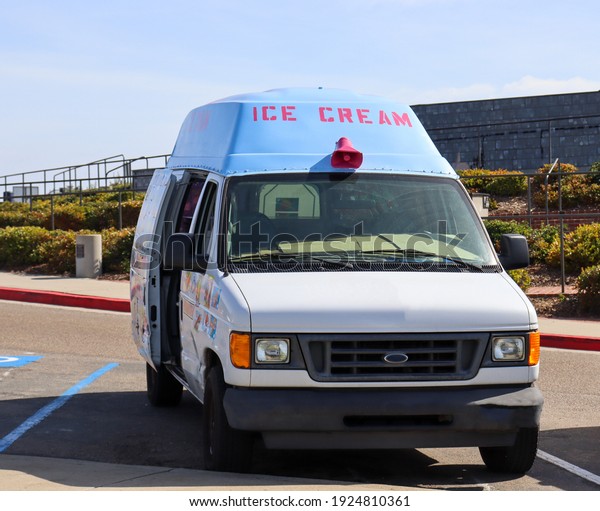 San Diego, California USA - February\
14, 2021: An ice cream truck parked at at\
park.