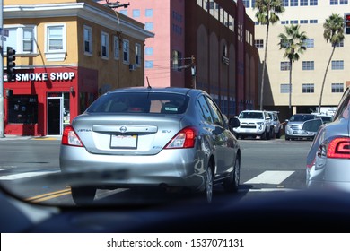 San Diego, CA/USA - October 20 2019: A Car With An Uber Sticker In An Intersection.