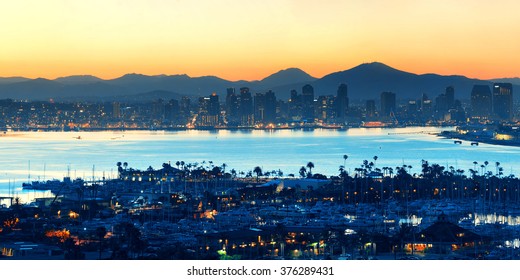 San Diego Downtown Skyline At Sunrise With Boat In Harbor.