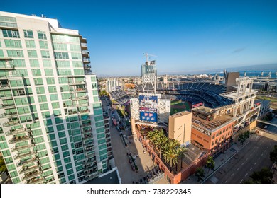 SAN DIEGO - JULY 29, 2017: Petco Park and Coronado Bridge on background. San Diego attracts 20 million people annually.