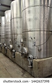 SAN DIEGO, USA- JULY 1, 2019: Wine Barrels Stacked In Modern Winery Cellar Located In San Diego, USA.