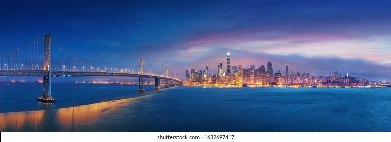 San Francisco Bay Bridge and San Francisco downtown in wide panorama photo - Powered by Shutterstock