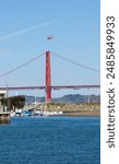 San Francisco Bay Bridge with an helicopter above captured