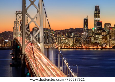 San Francisco Bay Bridge and Skyline at Dusk. Yerba Buena Island, San Francisco, California, USA.