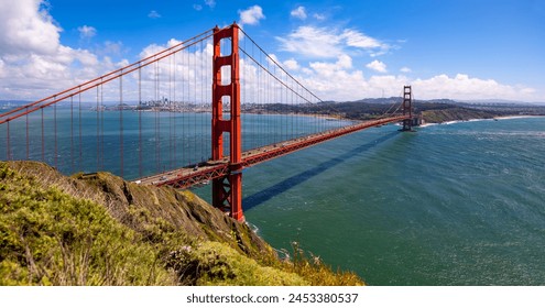 San Francisco Bay panorama with red colored Golden Gate Bridge from view point ”Battery Spencer“ on a clear sunny spring afternoon. Iconic infrastructure monument and world famous tourist attraction. - Powered by Shutterstock