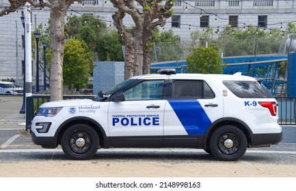 San Francisco, CA - April 22, 2022: Department Of Homeland Security Federal Vehicle Parked On The Walkway At Civic Center In Front Of City Hall As Canine Officer And Officer Sweep The Grounds.