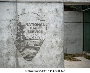 San Francisco, CA AUGUST 12, 2018: National Park Service Logo Adorning Concrete Wall Outside Visitors Center