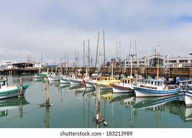 SAN FRANCISCO, CA - AUGUST 16, 2013: Fisher boats at Fisherman's Wharf. Fisherman's Wharf is a prominent tourist attraction point iin downtown San Francisco.