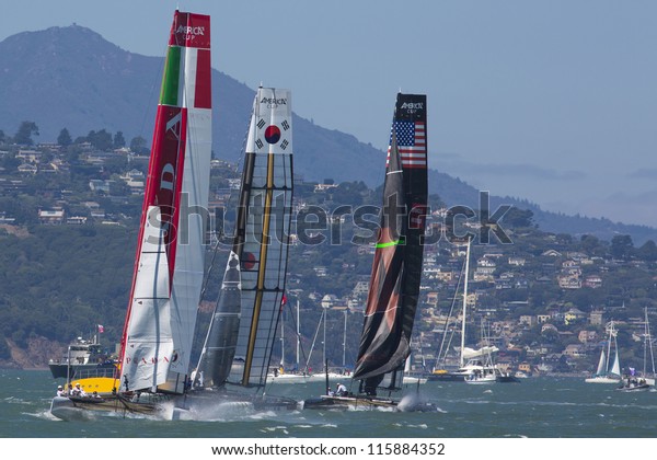 SAN\
FRANCISCO, CA - AUGUST 26: American team and the Korean team try to\
overtake the Italian team in the bay of San Francisco during the\
final of the America\'s Cup 2012. Aug 26\
2012