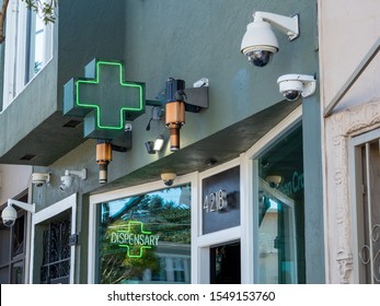 San Francisco, CA AUGUST 31, 2019: Green cross for a dispensary location in California for sale for of cannabis